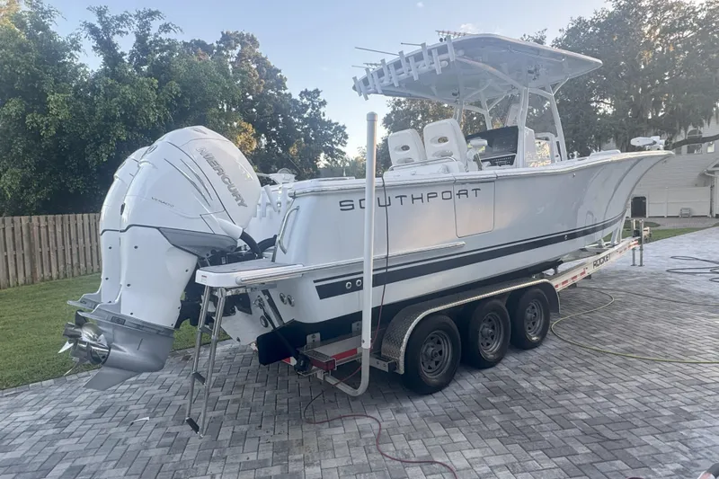  Yacht Photos Pics 2023 Southport 30 FE boat on trailer with Mercury outboard engines.