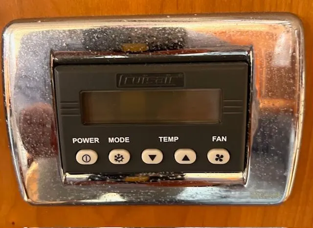 Force 10 Yacht Photos Pics Control panel of a 2008 Tartan 3400, featuring power, mode, temperature, and fan settings.