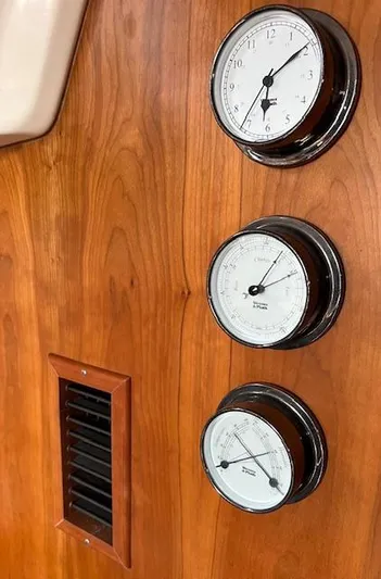 Force 10 Yacht Photos Pics Wooden panel with three nautical gauges on a 2008 Tartan 3400 yacht.