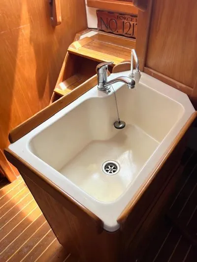 Force 10 Yacht Photos Pics Wooden boat interior with sink, Tartan 3400, 2008 model.