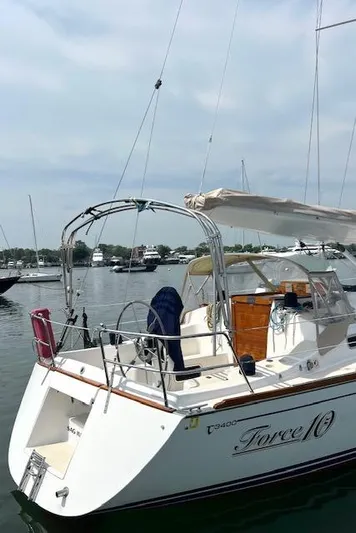 Force 10 Yacht Photos Pics Sailboat Tartan 3400, 2008 model, docked in a marina with calm waters.