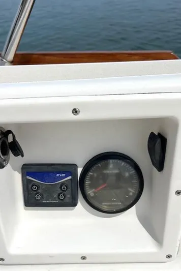 Force 10 Yacht Photos Pics Control panel of a 2008 Tartan 3400 boat with gauges and switches.