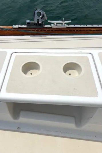 Force 10 Yacht Photos Pics Cup holders on a 2008 Tartan 3400 boat deck by the water.