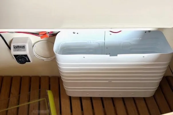 Force 10 Yacht Photos Pics Electrical setup on a 2008 Tartan 3400 boat, featuring a Votronic device and wiring.