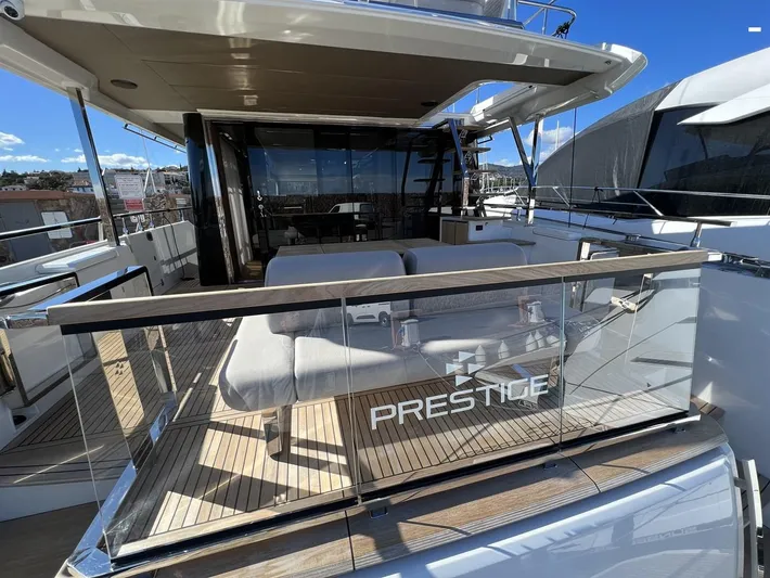  Yacht Photos Pics Luxury yacht Prestige X60 2023 with spacious deck and modern design.