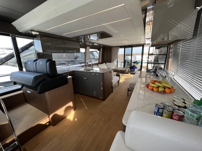  Yacht Photos Pics Luxurious interior of 2023 Prestige X60 yacht with modern furnishings and panoramic windows.