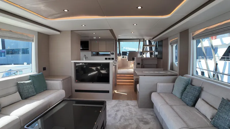  Yacht Photos Pics Luxurious interior of 2024 Gulf Craft Nomad 65 yacht with modern furnishings and elegant design.