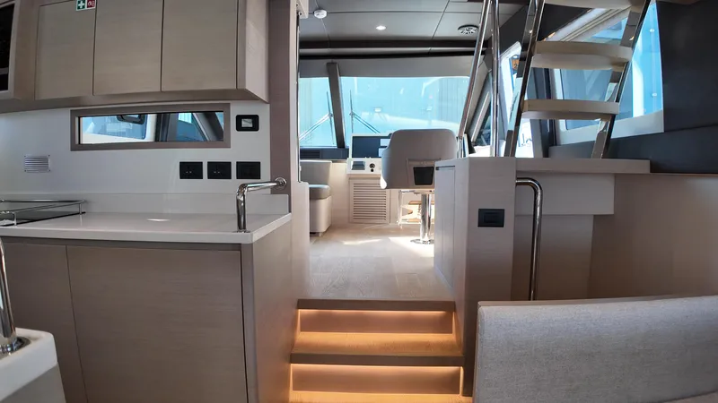  Yacht Photos Pics Luxurious interior of 2024 Gulf Craft Nomad 65 yacht with modern design and elegant finishes.