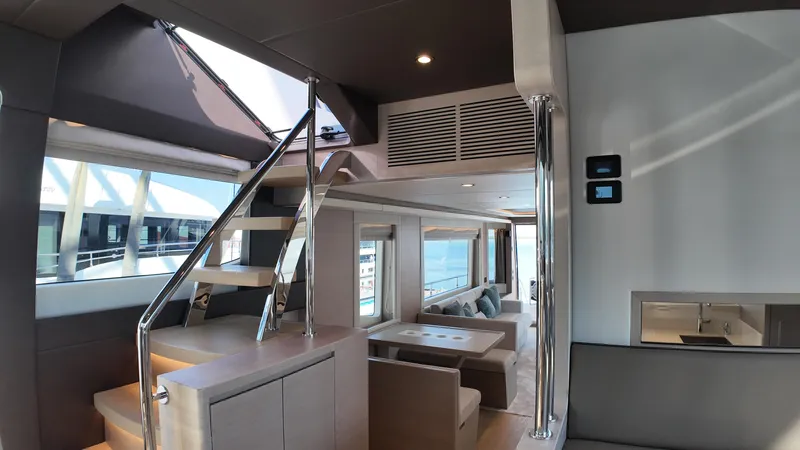  Yacht Photos Pics Luxurious interior of 2024 Gulf Craft Nomad 65 yacht with modern design and spacious seating.