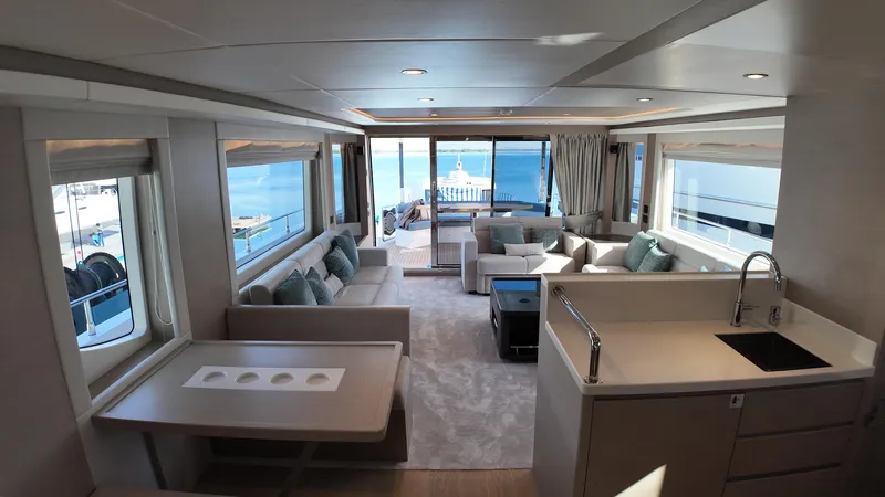  Yacht Photos Pics Luxurious interior of 2024 Gulf Craft Nomad 65 yacht with ocean view.