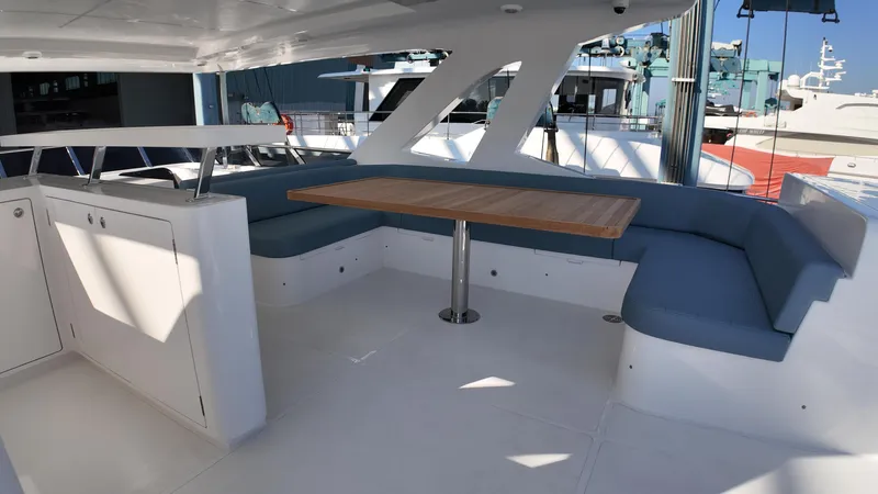  Yacht Photos Pics Luxurious seating area on 2024 Gulf Craft Nomad 65 yacht with modern design.