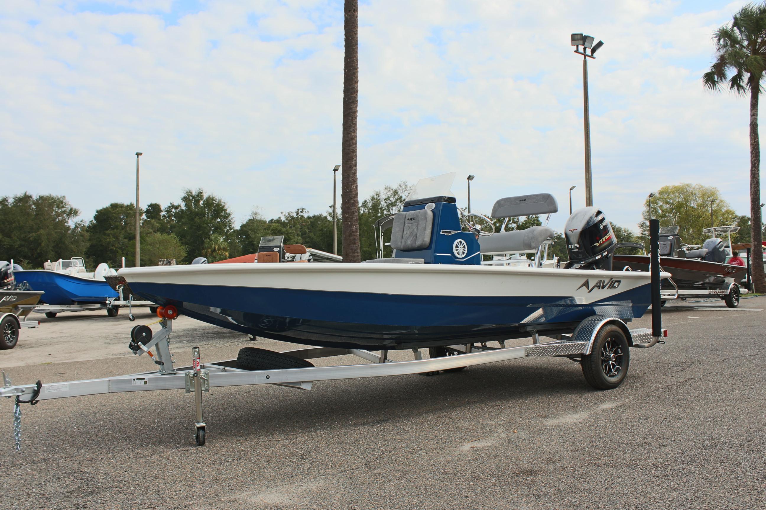 2025 Avid 19 FSX boat on trailer in outdoor setting.