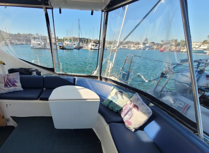 Ki Zen Yacht Photos Pics Interior view of 1995 Lagoon TPI 42 yacht with marina backdrop.