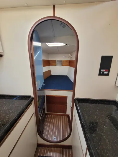 Ki Zen Yacht Photos Pics Interior of 1995 Lagoon TPI 42 yacht with wood accents and modern design.