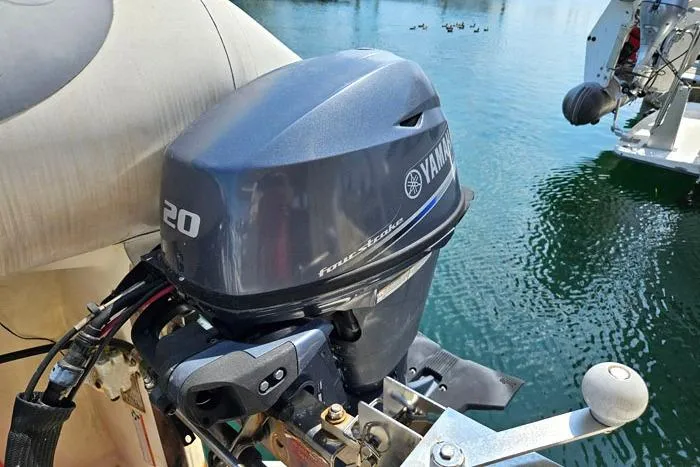  Yacht Photos Pics Yamaha 20 horsepower outboard motor on a 2007 Mainship 34 Trawler boat.