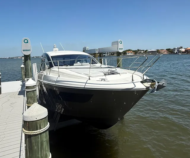  Yacht Photos Pics 2023 Beneteau Gran Turismo 45 yacht docked by the waterfront.