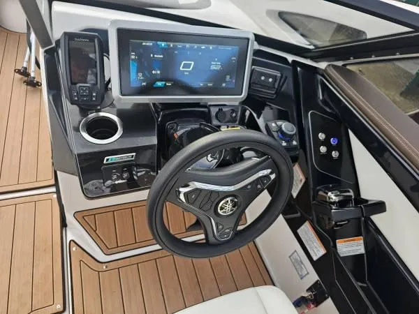  Yacht Photos Pics 2023 Yamaha Boats 275 SDX dashboard with advanced controls and touchscreen display.