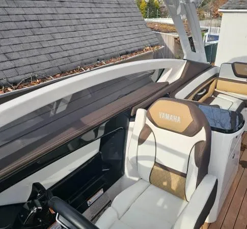  Yacht Photos Pics 2023 Yamaha Boats 275 SDX interior with luxurious seating and modern design.
