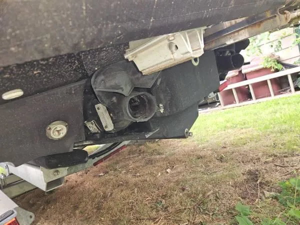  Yacht Photos Pics Close-up of 2023 Yamaha Boats 275 SDX jet propulsion system on grass.