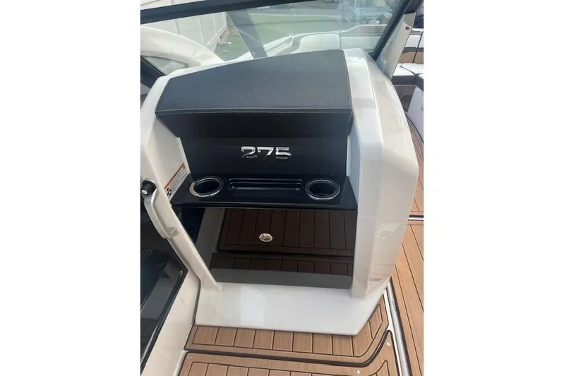  Yacht Photos Pics 2023 Yamaha Boats 275SDX interior with cup holders and sleek design.