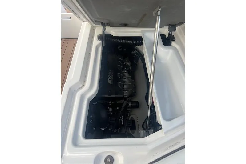  Yacht Photos Pics 2023 Yamaha Boats 275SDX engine compartment, showcasing powerful motor components.