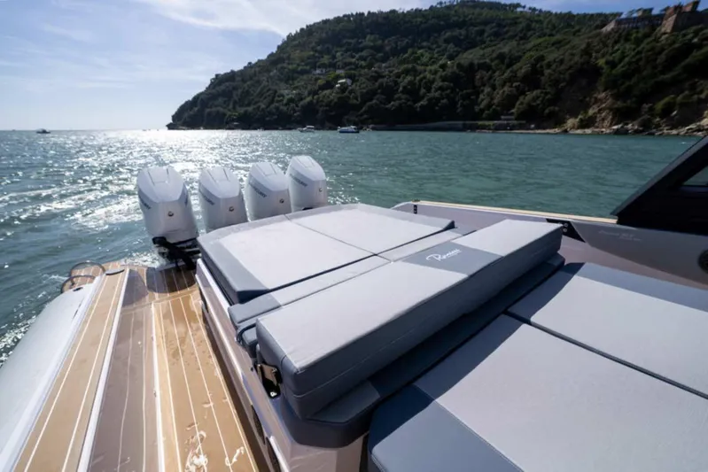  Yacht Photos Pics 2026 Ranieri CAYMAN 50 HARDTOP yacht with sunbathing area and powerful engines on scenic water.