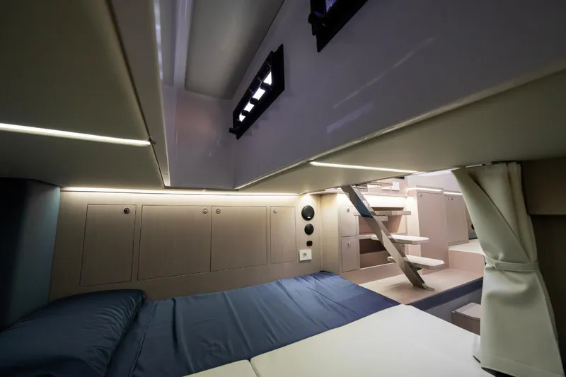  Yacht Photos Pics Luxurious interior cabin of 2026 Ranieri CAYMAN 50 HARDTOP yacht with modern design.