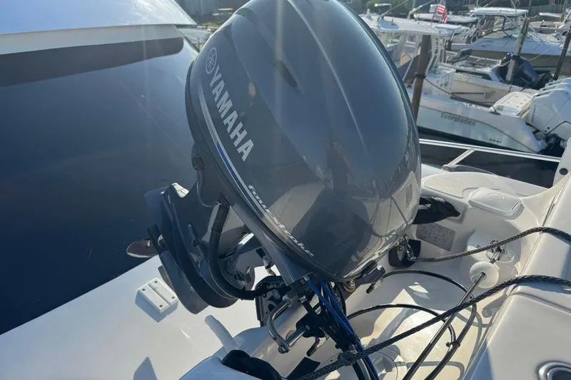 Miss Maggie Yacht Photos Pics Yamaha outboard motor on 2002 Viking 61 Enclosed Bridge yacht, docked in marina.