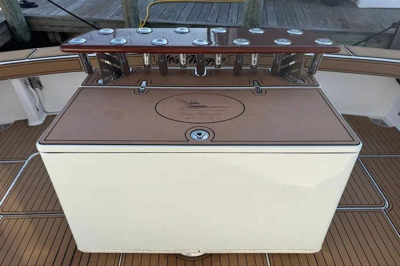 Miss Maggie Yacht Photos Pics 2002 Viking 61 Enclosed Bridge yacht deck with fishing rod holders.