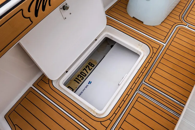 Miss Maggie Yacht Photos Pics Open hatch on 2002 Viking 61 Enclosed Bridge boat with teak flooring.