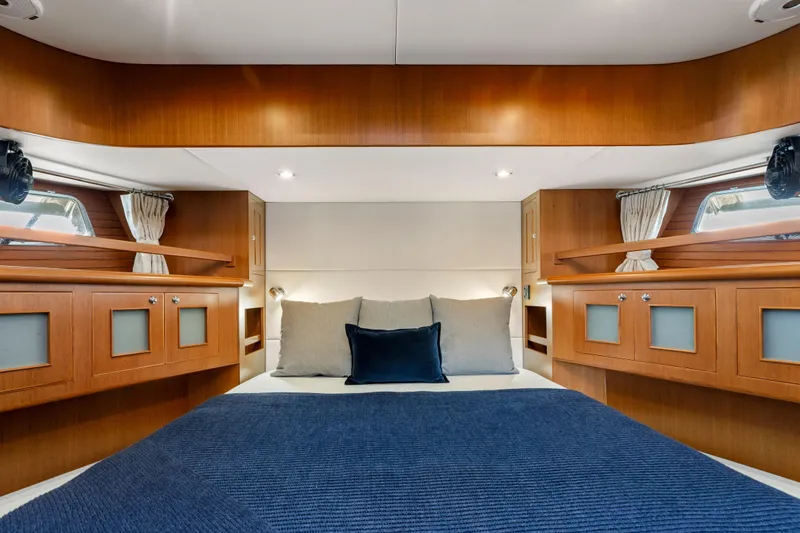 Tumbleweed Yacht Photos Pics Luxurious cabin interior of 2016 North Pacific 49 Pilothouse yacht with elegant wood finish.