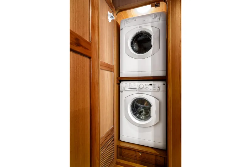 Tumbleweed Yacht Photos Pics Stacked washer and dryer in 2016 North Pacific 49 Pilothouse yacht interior.