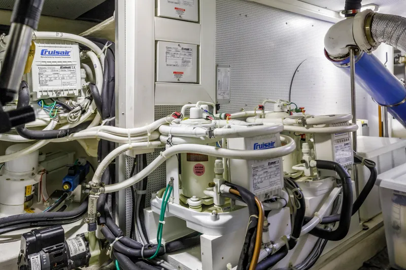 Tumbleweed Yacht Photos Pics Engine room of 2016 North Pacific 49 Pilothouse with Cruisair systems and wiring.