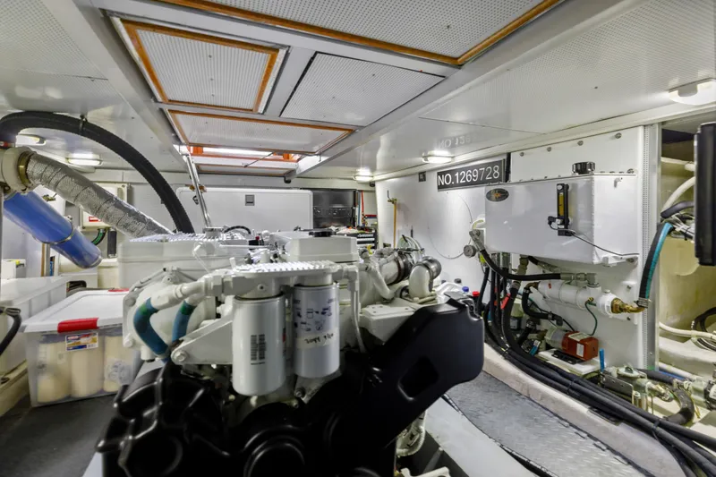 Tumbleweed Yacht Photos Pics Engine room of 2016 North Pacific 49 Pilothouse yacht, showcasing mechanical components.
