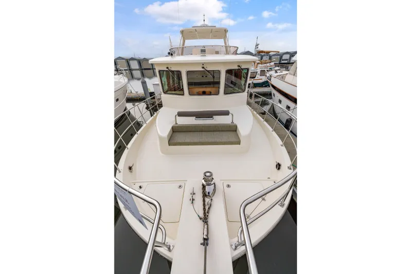 Tumbleweed Yacht Photos Pics 2016 North Pacific 49 Pilothouse yacht with spacious deck and seating area.