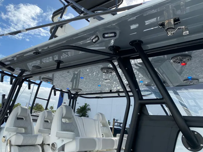  Yacht Photos Pics 2021 Freeman 42 LR boat interior with white seating and overhead lighting.