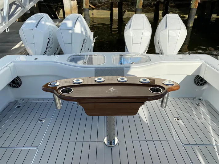  Yacht Photos Pics Freeman 42 LR 2021 boat deck with fishing rod holders and powerful engines.