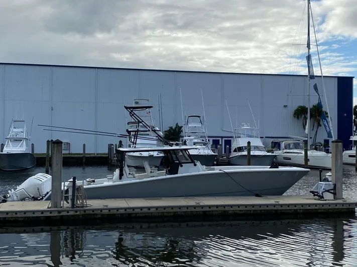  Yacht Photos Pics 2021 Freeman 42 LR boat docked at marina with overcast sky.