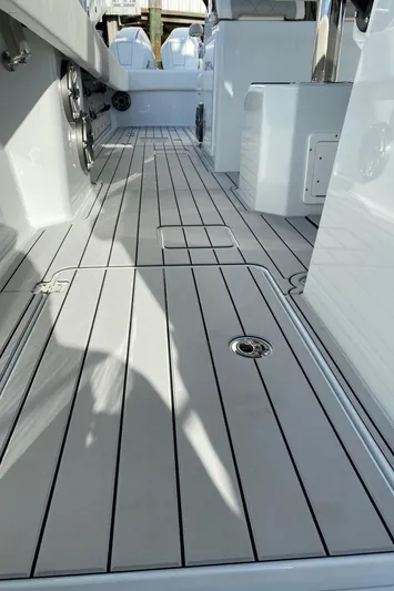 Yacht Photos Pics Freeman 42 LR 2021 boat deck with sleek, modern design and clean lines.