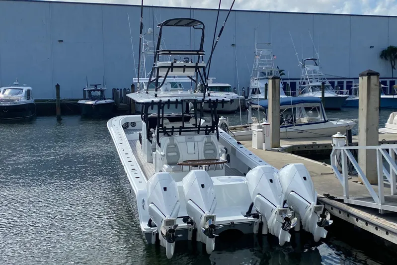  Yacht Photos Pics Freeman 42 LR 2021 boat docked with four outboard engines.