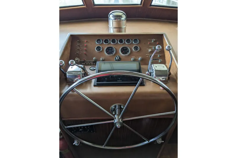 Sky To Sea Yacht Photos Pics Helm of 1984 Hatteras 53 Extended Deckhouse Motor Yacht with gauges and controls.