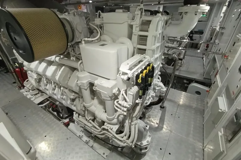 Sehamia Yacht Photos Pics Engine room of 2018 Gulf Craft Majesty 155 yacht, showcasing intricate machinery and components.