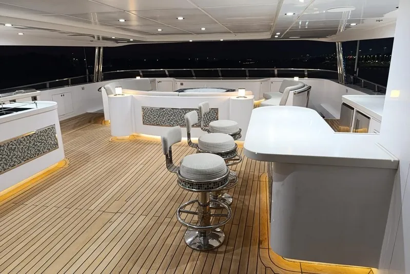 Sehamia Yacht Photos Pics Luxurious 2018 Gulf Craft Majesty 155 yacht deck with elegant seating and ambient lighting.