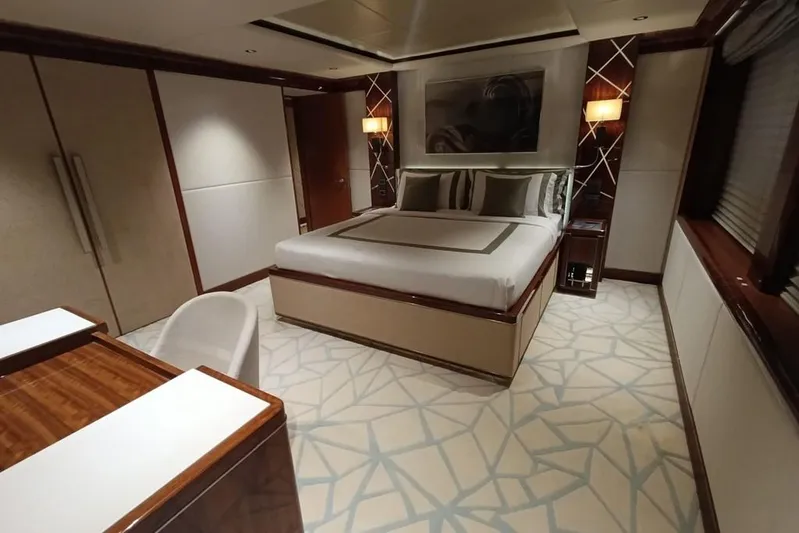 Sehamia Yacht Photos Pics Luxurious bedroom interior on 2018 Gulf Craft Majesty 155 yacht, featuring elegant decor and modern furnishings.