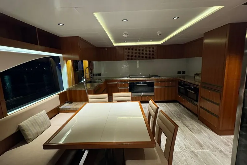 Sehamia Yacht Photos Pics Luxurious kitchen interior of 2018 Gulf Craft Majesty 155 yacht with modern design and wood finishes.