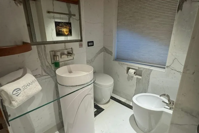 Sehamia Yacht Photos Pics Luxurious bathroom on 2018 Gulf Craft Majesty 155 yacht, featuring modern fixtures and elegant design.