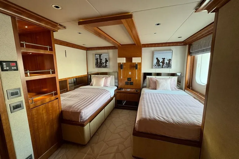 Sehamia Yacht Photos Pics Luxurious twin bedroom on 2018 Gulf Craft Majesty 155 yacht, featuring elegant wood finishes.