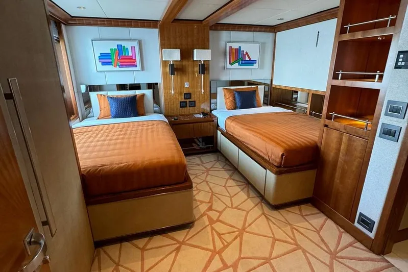 Sehamia Yacht Photos Pics Luxurious twin bedroom on 2018 Gulf Craft Majesty 155 yacht, featuring modern decor and elegant furnishings.