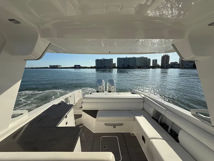  Yacht Photos Pics 2021 Aviara AV32 OB boat interior with waterfront cityscape view.