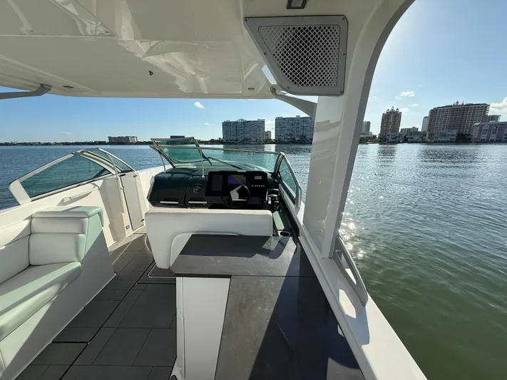  Yacht Photos Pics 2021 Aviara AV32 OB boat interior with city skyline view on the water.